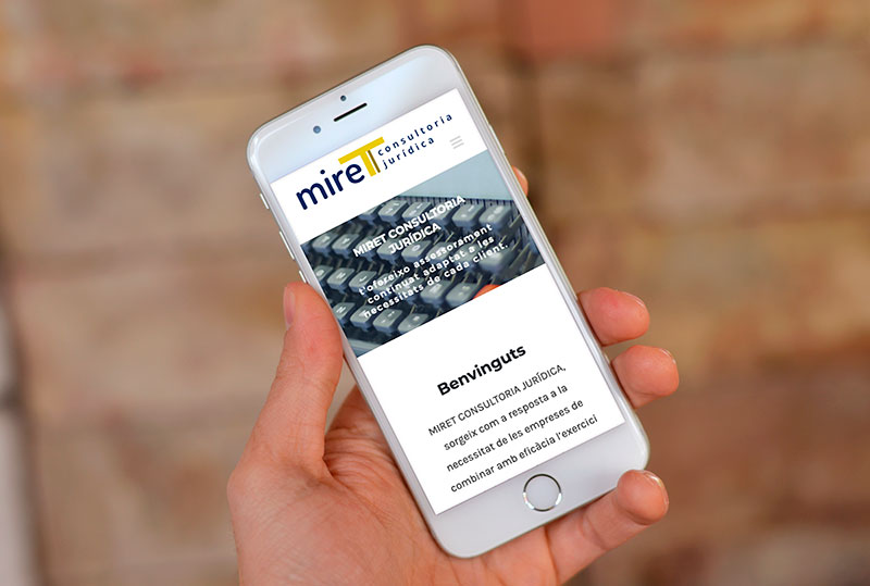 Miret Consultoria Jurídica en versión móvil Versión móvil de la web de Miret Consultoria Jurídica en pantalla de smartphone.